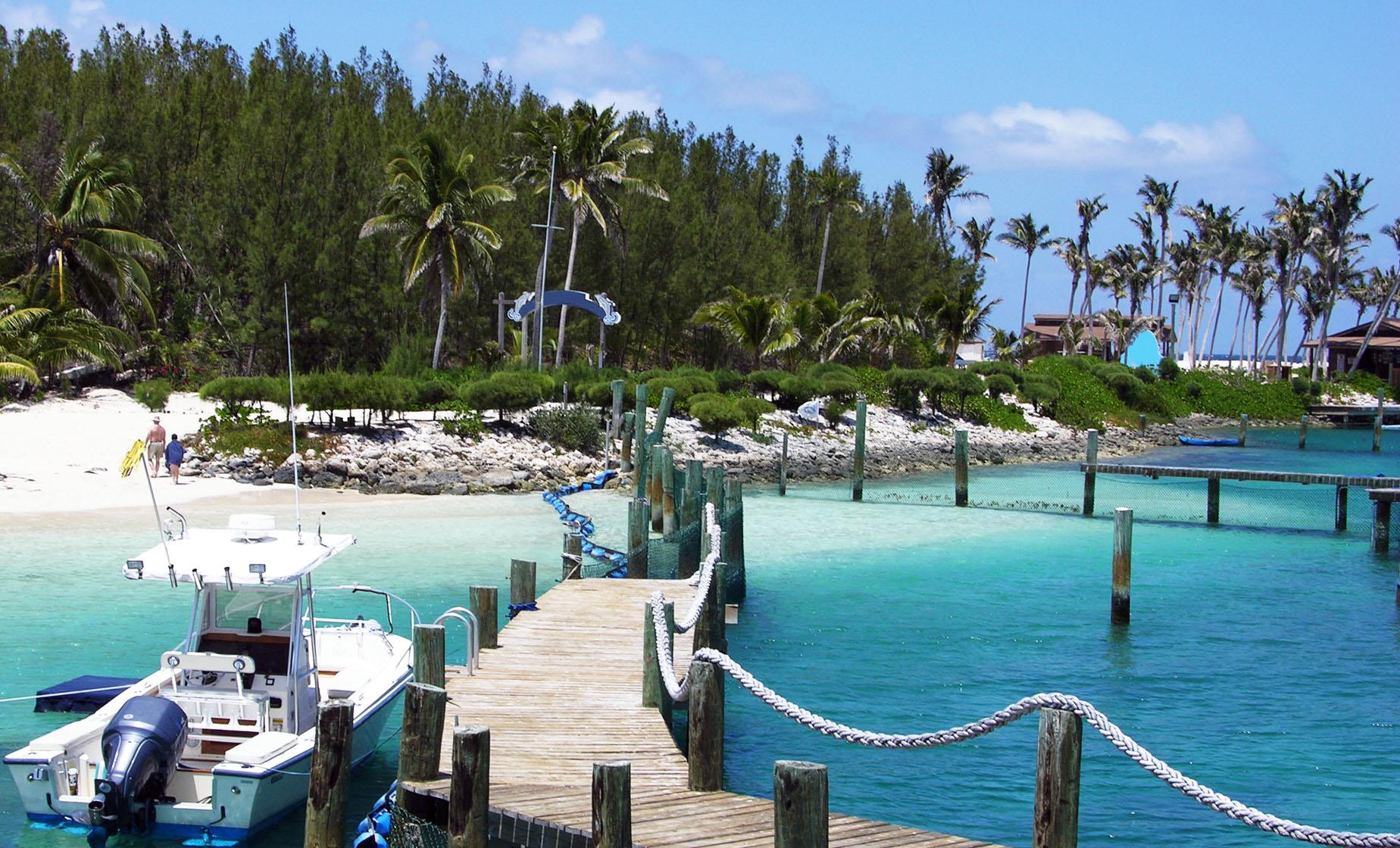 Blue Lagoon Island beach dock and boat.